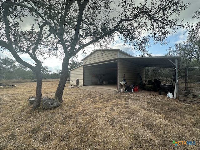 exterior space with a carport