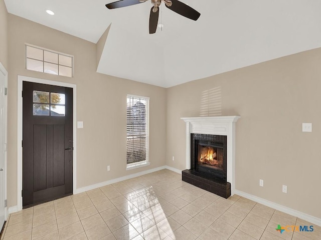 tiled foyer entrance featuring ceiling fan