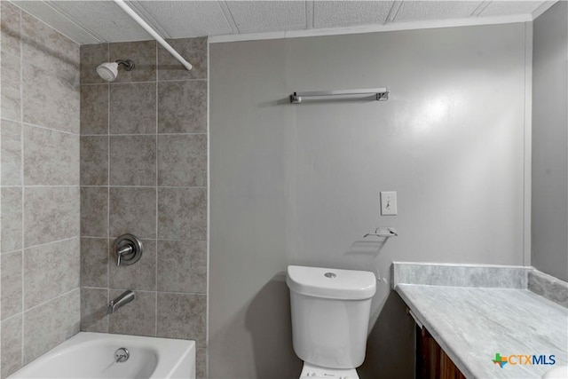 full bathroom featuring vanity, toilet, and tiled shower / bath combo