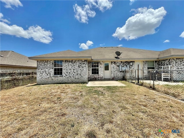3805 Uvalde Dr, Killeen, TX 76549 - back of house with a patio and brick siding