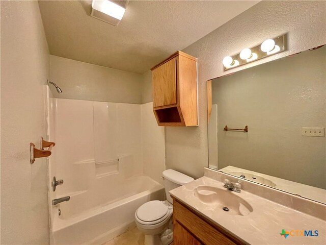 3805 Uvalde Dr, Killeen, TX 76549 - full bath with a textured wall, toilet, vanity, washtub / shower combination, and a textured ceiling