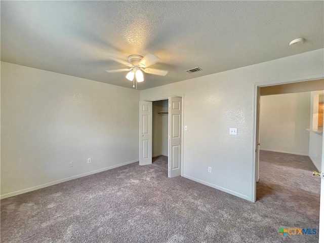 3805 Uvalde Dr, Killeen, TX 76549 - unfurnished bedroom featuring carpet, a textured ceiling, baseboards, a closet, and ceiling fan