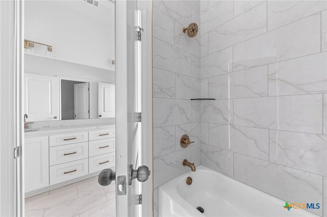 full bath with visible vents, vanity, and shower / tub combination