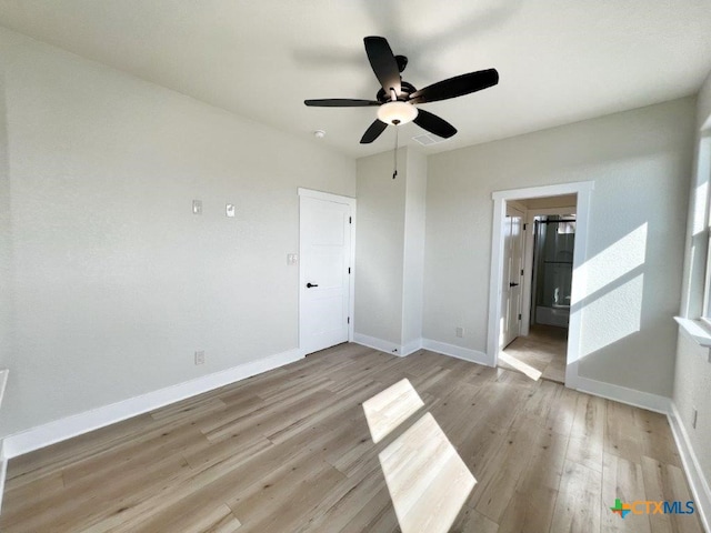 unfurnished bedroom featuring light hardwood / wood-style floors and ceiling fan