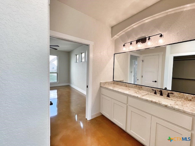 bathroom featuring concrete flooring, vanity, and ceiling fan