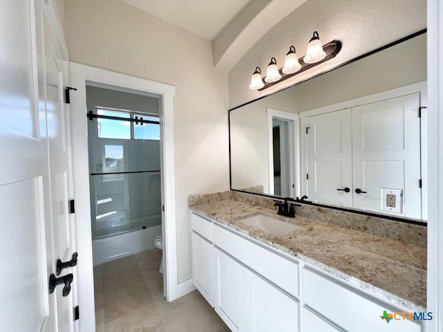 full bathroom featuring shower / washtub combination, vanity, and toilet