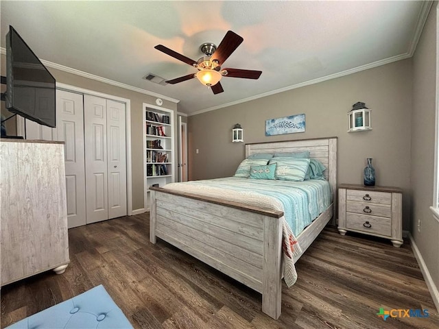 1403 Bill Tindall Ave, Seadrift, TX 77983 - bedroom with dark wood finished floors, ornamental molding, baseboards, a ceiling fan, and a closet