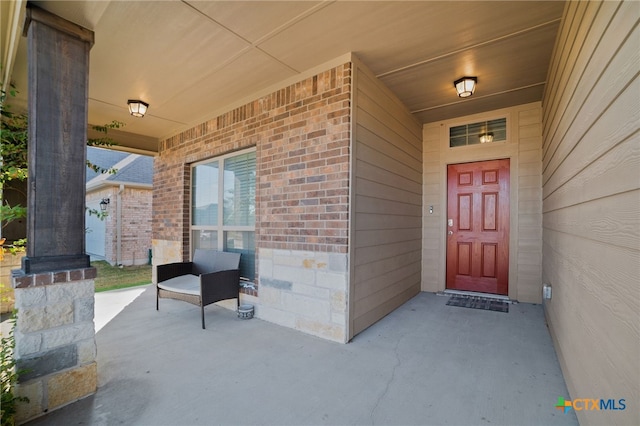 property entrance with a garage