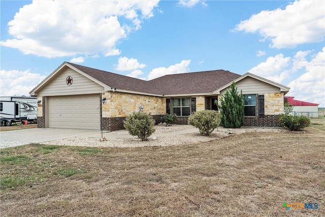 ranch-style house featuring a garage