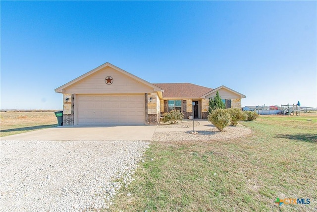 single story home featuring a front yard and a garage