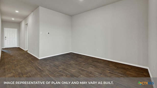 empty room featuring recessed lighting, dark wood finished floors, and baseboards