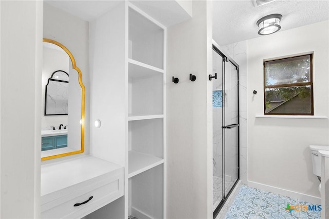 213 Tracy Ln, Victoria, TX 77904 - full bathroom featuring a stall shower, tile patterned floors, and vanity