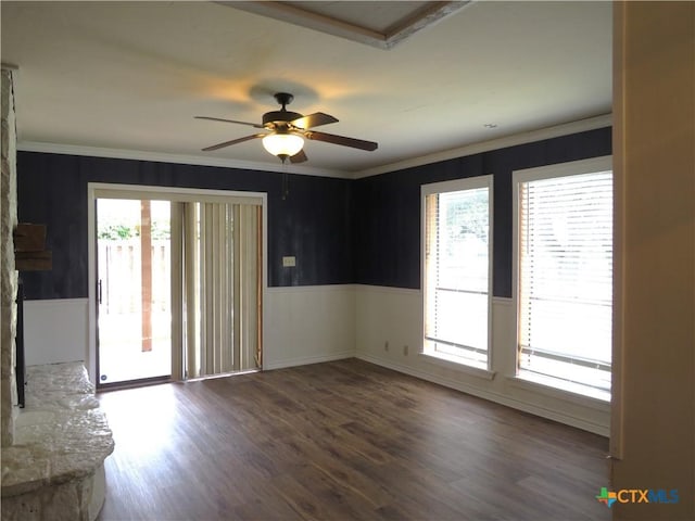 213 Tracy Ln, Victoria, TX 77904 - unfurnished room featuring wainscoting, ornamental molding, wood finished floors, and ceiling fan