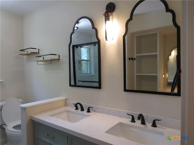 213 Tracy Ln, Victoria, TX 77904 - full bathroom with toilet and double vanity