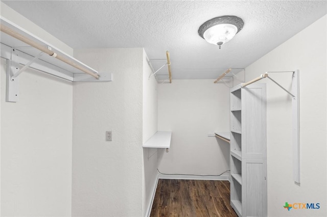 213 Tracy Ln, Victoria, TX 77904 - walk in closet featuring wood finished floors
