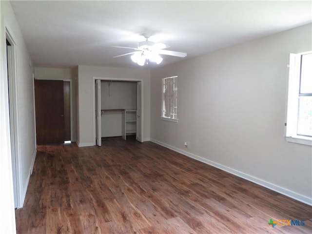 213 Tracy Ln, Victoria, TX 77904 - unfurnished bedroom with wood finished floors and ceiling fan