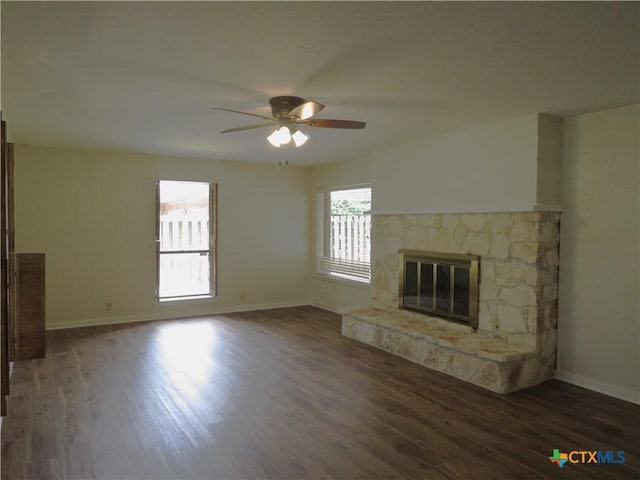 213 Tracy Ln, Victoria, TX 77904 - unfurnished living room with a fireplace, a ceiling fan, and wood finished floors