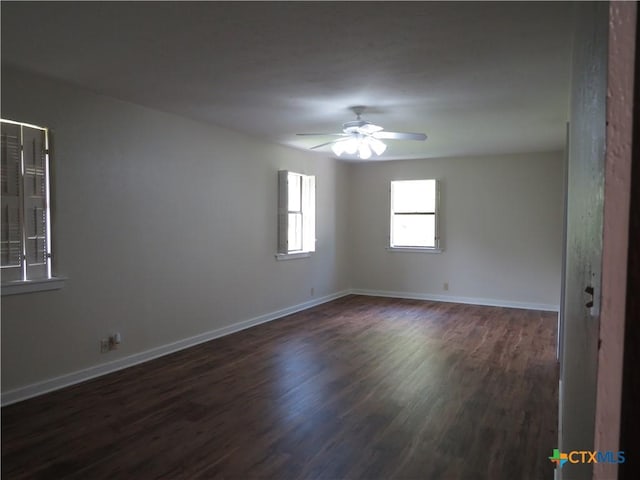 213 Tracy Ln, Victoria, TX 77904 - empty room with ceiling fan and dark wood finished floors