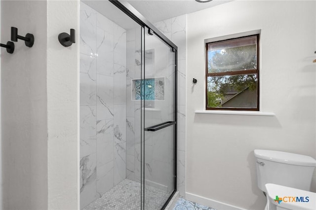 213 Tracy Ln, Victoria, TX 77904 - full bath featuring a marble finish shower and toilet