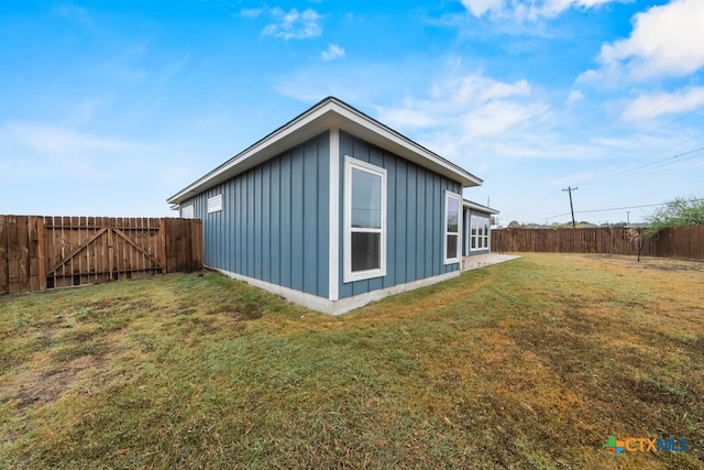 view of home's exterior featuring a yard