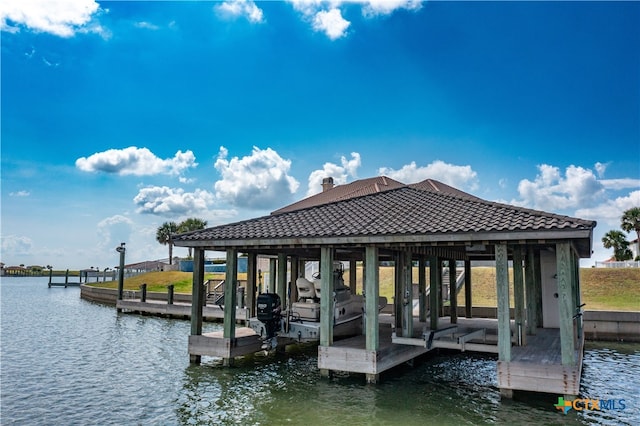 dock area featuring a water view