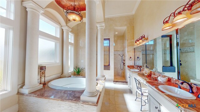 bathroom featuring ornamental molding, vanity, a notable chandelier, tile patterned floors, and separate shower and tub