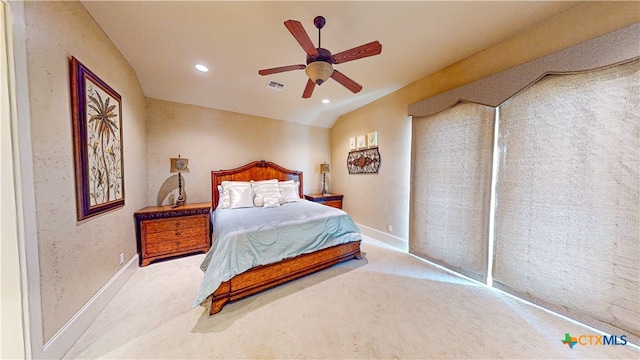 carpeted bedroom with lofted ceiling and ceiling fan