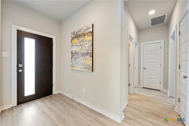 2917 Sage Ranch Dr, Leander, TX 78641 - foyer featuring light wood-style floors and baseboards