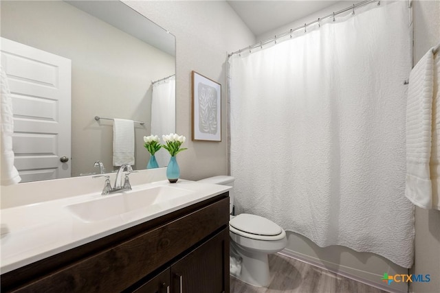 2917 Sage Ranch Dr, Leander, TX 78641 - bathroom featuring vanity, wood finished floors, and shower / bathtub combination with curtain