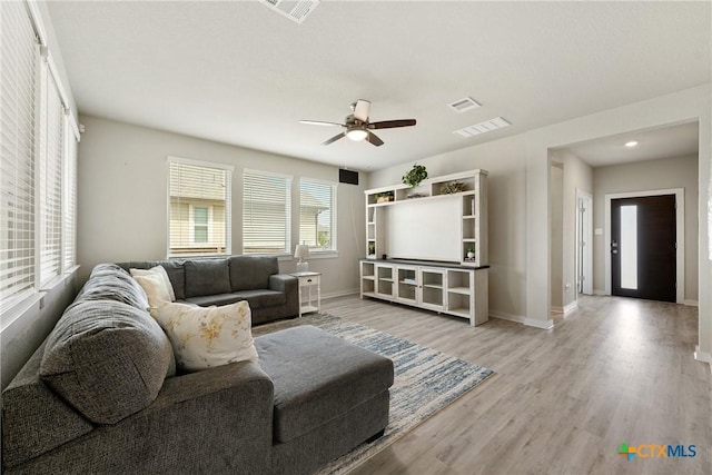 2917 Sage Ranch Dr, Leander, TX 78641 - living room featuring ceiling fan and light wood-style flooring