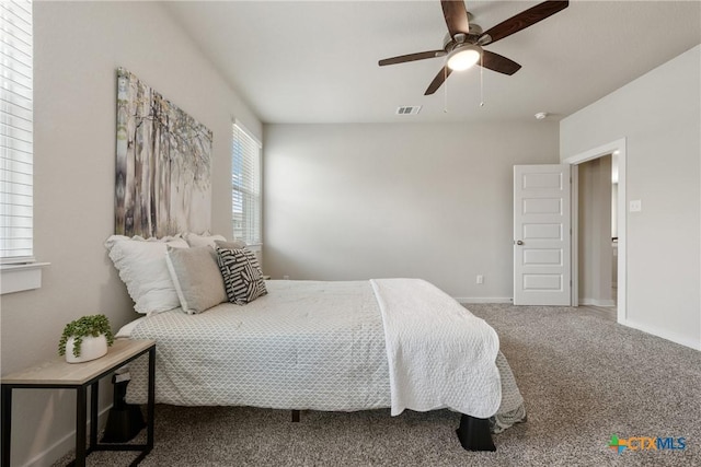 2917 Sage Ranch Dr, Leander, TX 78641 - carpeted bedroom with ceiling fan and baseboards