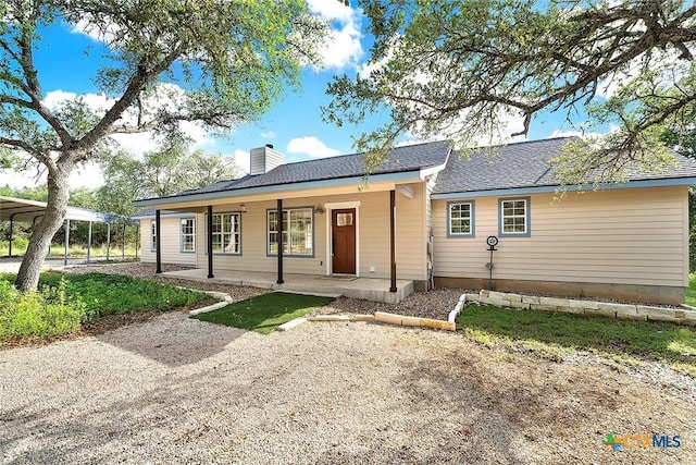 661 Abels Way, Canyon Lake, TX 78133 - single story home featuring a chimney and a porch