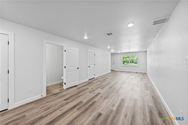 616 S 24th St, Temple, TX 76501 - below grade area featuring light wood-type flooring, recessed lighting, and baseboards