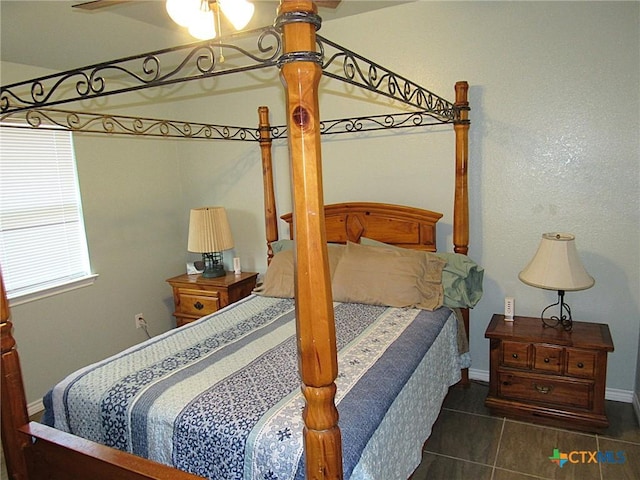 1104 N Blair St, Belton, TX 76513 - tiled bedroom featuring baseboards