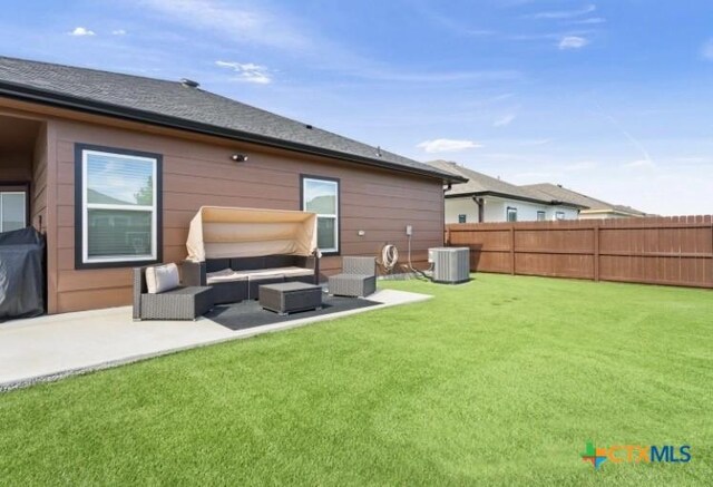 1606 Fiddle Wood Way, Temple, TX 76502 - rear view of house with an outdoor hangout area and a patio