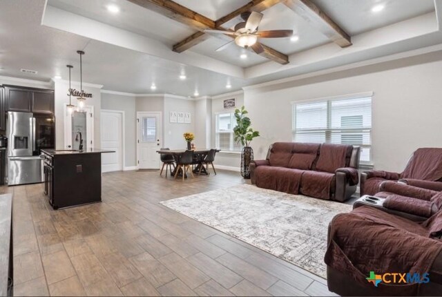 1606 Fiddle Wood Way, Temple, TX 76502 - living area with ceiling fan, coffered ceiling, light wood-type flooring, recessed lighting, and beam ceiling
