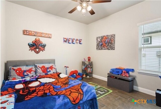 1606 Fiddle Wood Way, Temple, TX 76502 - bedroom featuring wood finished floors and ceiling fan