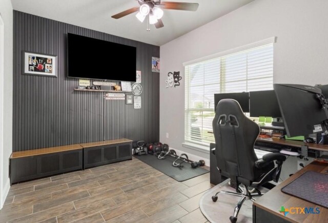 1606 Fiddle Wood Way, Temple, TX 76502 - office with a ceiling fan, wood finished floors, and an accent wall
