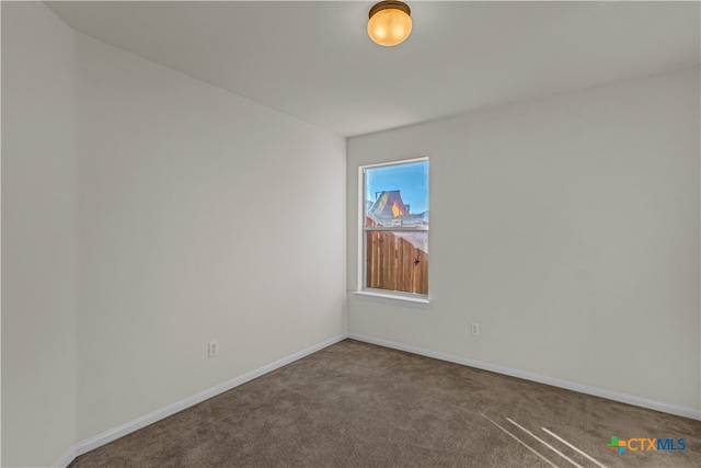 view of carpeted spare room