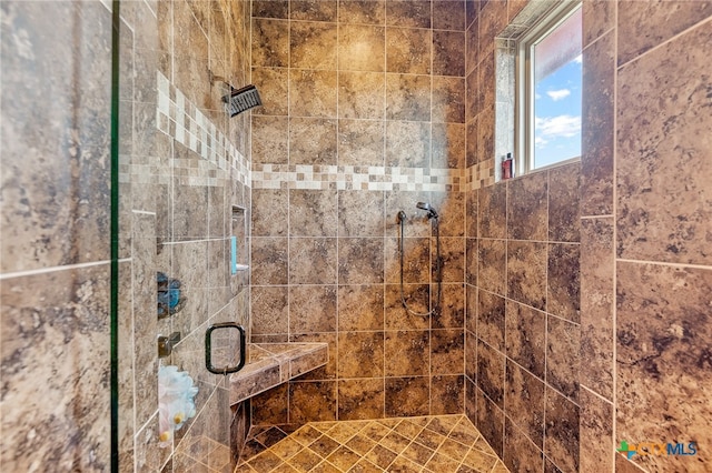 bathroom with an enclosed shower