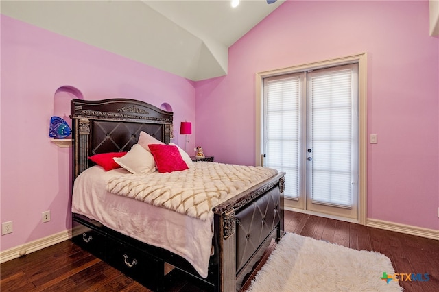 bedroom featuring dark hardwood / wood-style floors and lofted ceiling