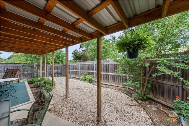 view of patio featuring a fenced backyard