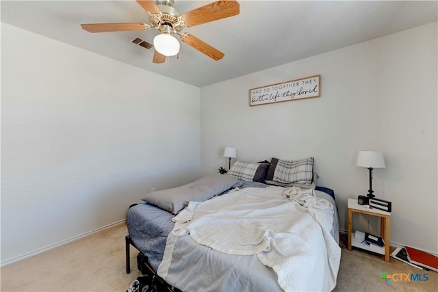 carpeted bedroom featuring ceiling fan