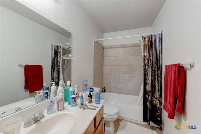 full bathroom featuring vanity, toilet, and shower / bathtub combination with curtain