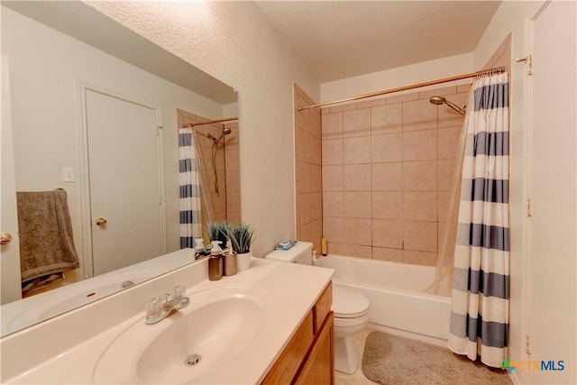 full bathroom featuring vanity, toilet, and shower / bath combo with shower curtain