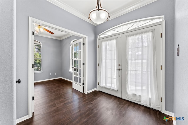 entrance foyer featuring ornamental molding, french doors, dark hardwood / wood-style floors, and ceiling fan