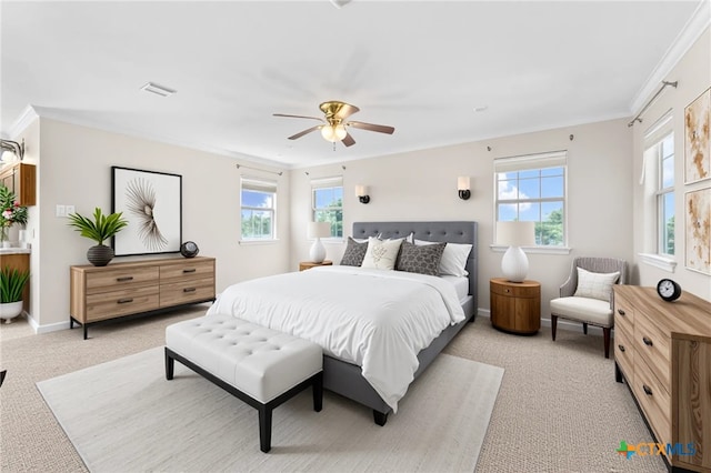 16047 Charlya Dr, Temple, TX 76502 - bedroom featuring light carpet, multiple windows, crown molding, baseboards, and a ceiling fan