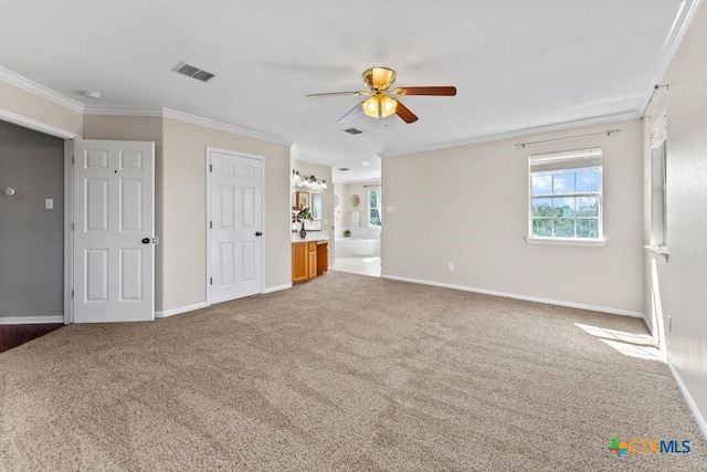 16047 Charlya Dr, Temple, TX 76502 - carpeted empty room with ceiling fan, ornamental molding, baseboards, and a smoke detector
