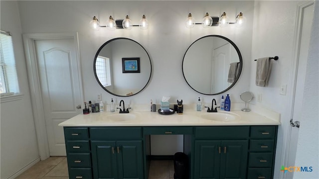 bathroom featuring tile patterned flooring and vanity