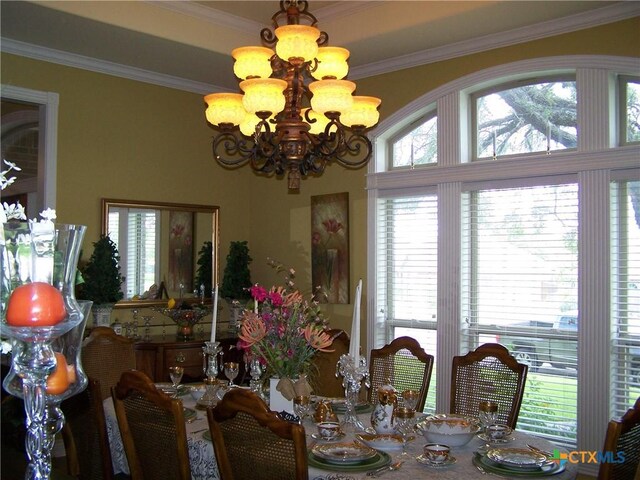 101 Laurel Oak Cir, Cuero, TX 77954 - dining space with a chandelier and ornamental molding